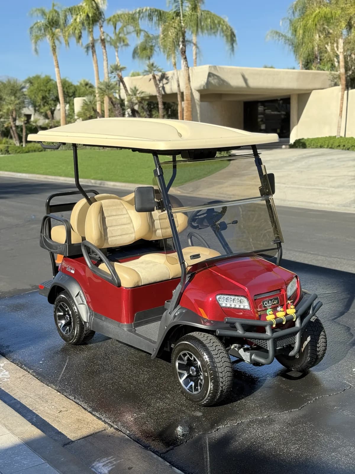 Complete red golf cart after professional detailing